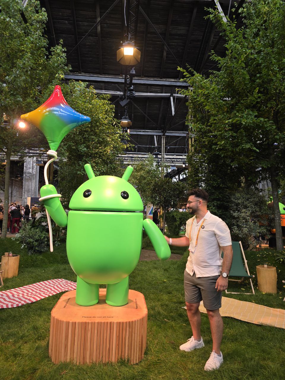 Alex in front of an interesting architectural background.